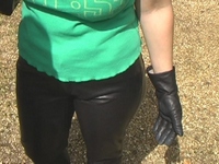 Girl-in-leather-pants-and-leather-gloves-with-jacket-and-boots