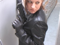Girl-in-leather-pants-and-leather-gloves-with-jacket-and-boots