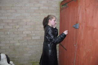 girl-in-leather-jacket-long-leather-boots-on-phone