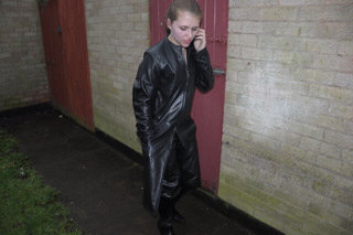 girl-in-leather-jacket-long-leather-boots-on-phone