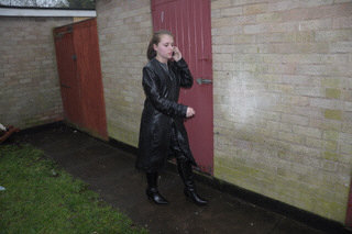 girl-in-leather-jacket-long-leather-boots-on-phone