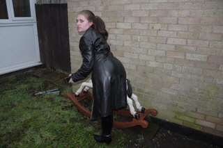 girl-in-leather-jacket-long-leather-boots-on-phone