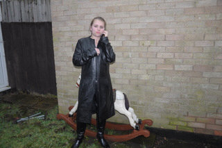 girl-in-leather-jacket-long-leather-boots-on-phone