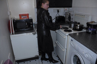 girl-in-leather-jacket-long-leather-boots-on-phone