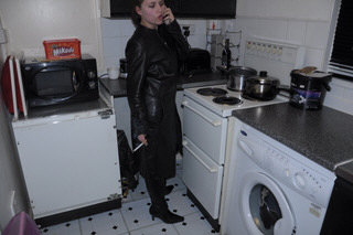 girl-in-leather-jacket-long-leather-boots-on-phone