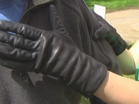 Girl-in-leather-pants-and-leather-gloves-with-jacket-and-boots