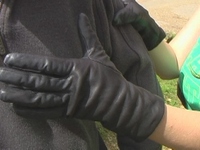 Girl-in-leather-pants-and-leather-gloves-with-jacket-and-boots