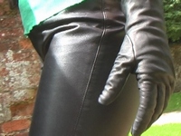 Girl-in-leather-pants-and-leather-gloves-with-jacket-and-boots