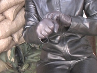 Girl-in-leather-pants-and-leather-gloves-with-jacket-and-boots