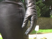 Girl-in-leather-pants-and-leather-gloves-with-jacket-and-boots