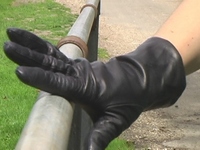 Girl-in-leather-pants-and-leather-gloves-with-jacket-and-boots