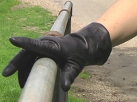 Girl-in-leather-pants-and-leather-gloves-with-jacket-and-boots