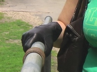 Girl-in-leather-pants-and-leather-gloves-with-jacket-and-boots