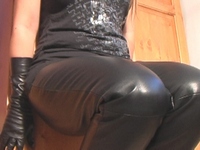 Girl-in-leather-pants-and-leather-gloves-with-jacket-and-boots