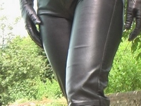 Girl-in-leather-pants-and-leather-gloves-with-jacket-and-boots