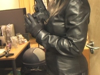 Girl-in-leather-pants-and-leather-gloves-with-jacket-and-boots