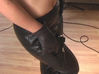 Girl-in-leather-pants-and-leather-gloves-with-jacket-and-boots