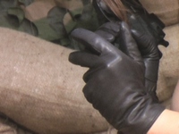 Girl-in-leather-pants-and-leather-gloves-with-jacket-and-boots