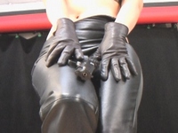 Girl-in-leather-pants-and-leather-gloves-with-jacket-and-boots