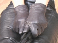 Girl-in-leather-pants-and-leather-gloves-with-jacket-and-boots