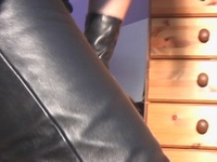 Girl-in-leather-pants-and-leather-gloves-with-jacket-and-boots