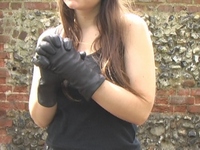 Girl-in-leather-pants-and-leather-gloves-with-jacket-and-boots