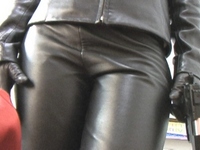 Girl-in-leather-pants-and-leather-gloves-with-jacket-and-boots