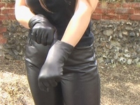 Girl-in-leather-pants-and-leather-gloves-with-jacket-and-boots