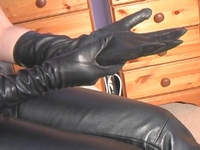 Girl-in-leather-pants-and-leather-gloves-with-jacket-and-boots