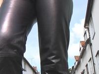 Girl-in-leather-pants-and-leather-gloves-with-jacket-and-boots