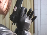 Girl-in-leather-pants-and-leather-gloves-with-jacket-and-boots