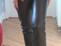 Girl-in-leather-pants-and-leather-gloves-with-jacket-and-boots