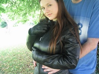 Girl-in-leather-pants-and-leather-gloves-with-jacket-and-boots