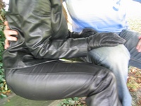 Girl-in-leather-pants-and-leather-gloves-with-jacket-and-boots