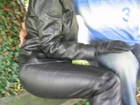 Girl-in-leather-pants-and-leather-gloves-with-jacket-and-boots