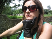 Girl-in-leather-pants-and-leather-gloves-with-jacket-and-boots